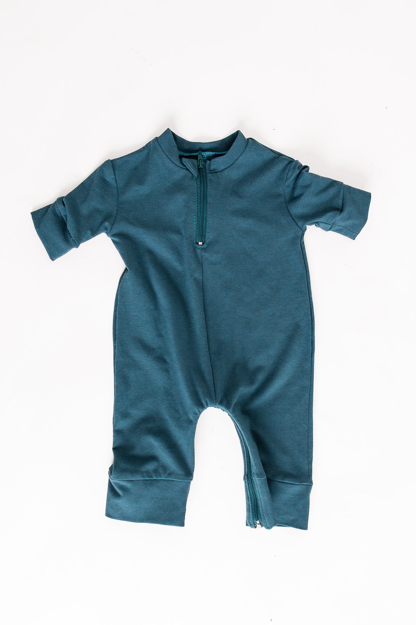 An example of the Adaptive Baby Romper is in blue. Developed by South64 Clothing in Grande Prairie, Alberta.