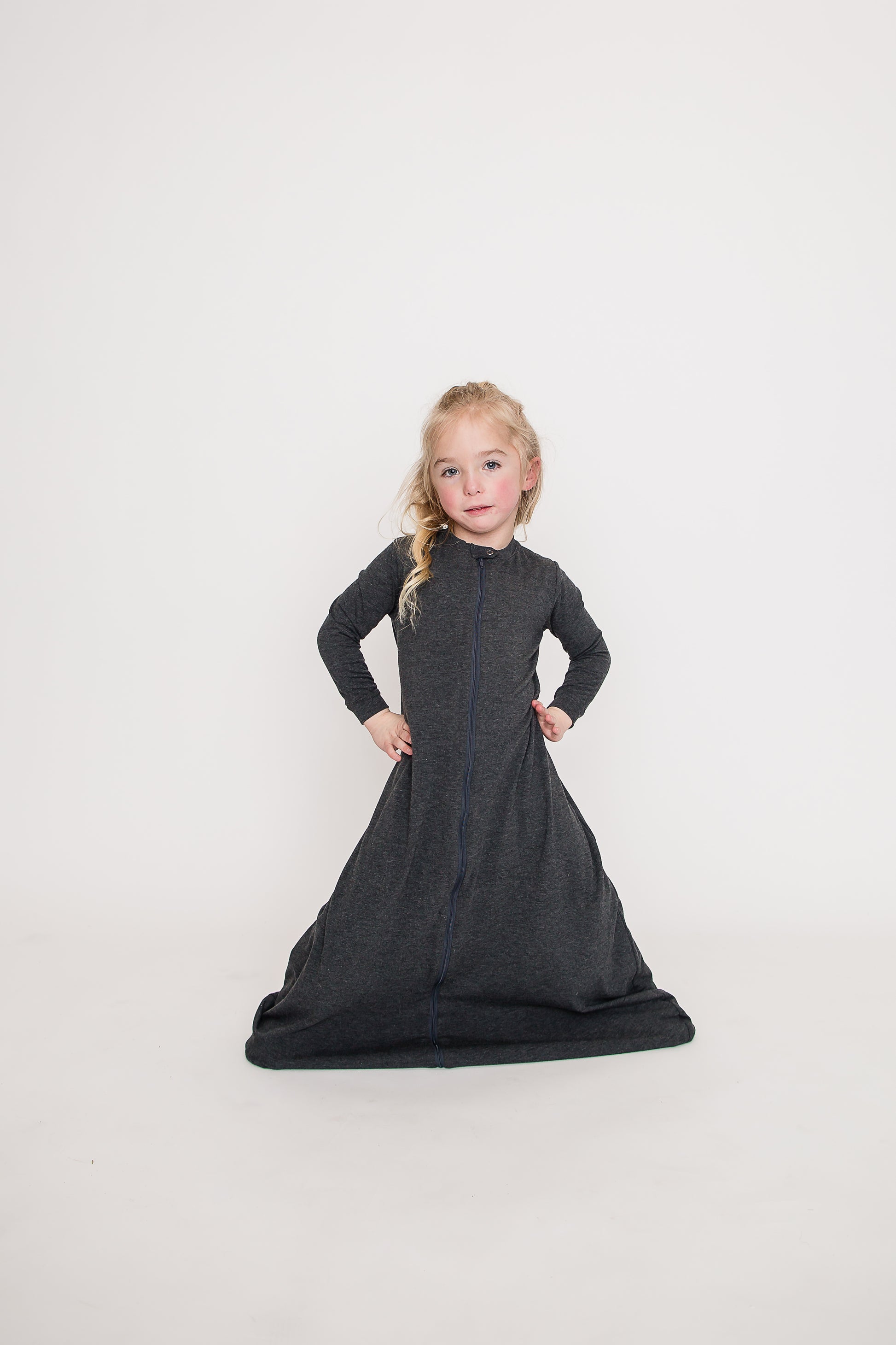 Youth wearing the Full Sleeve Grey Adaptive Sleep Sack. 